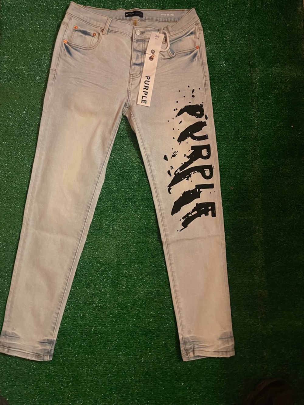 Light Wash Jeans with Black 'PURPLE' Graphic